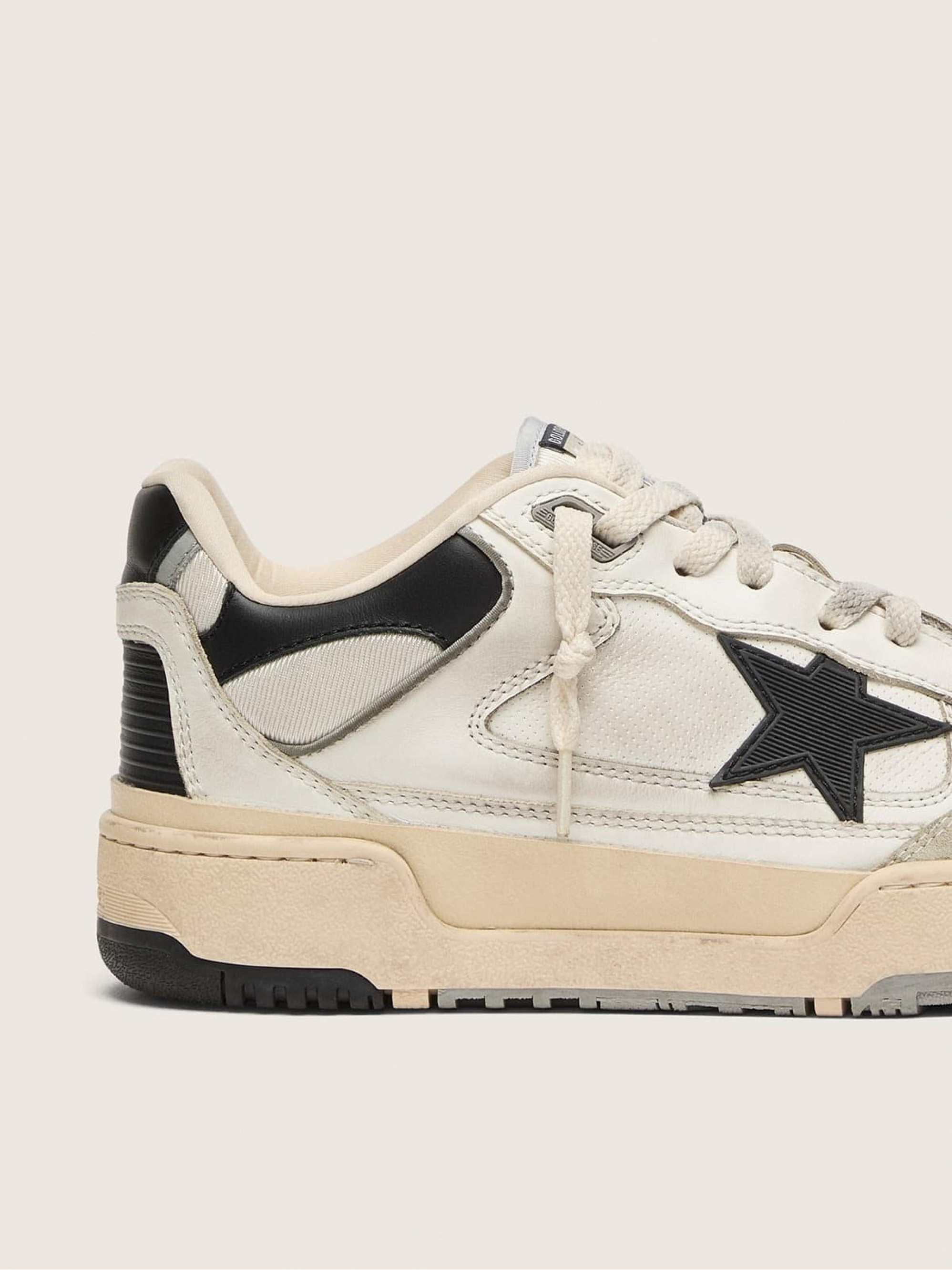 Men’s Forty2 with black star and black leather heel tab