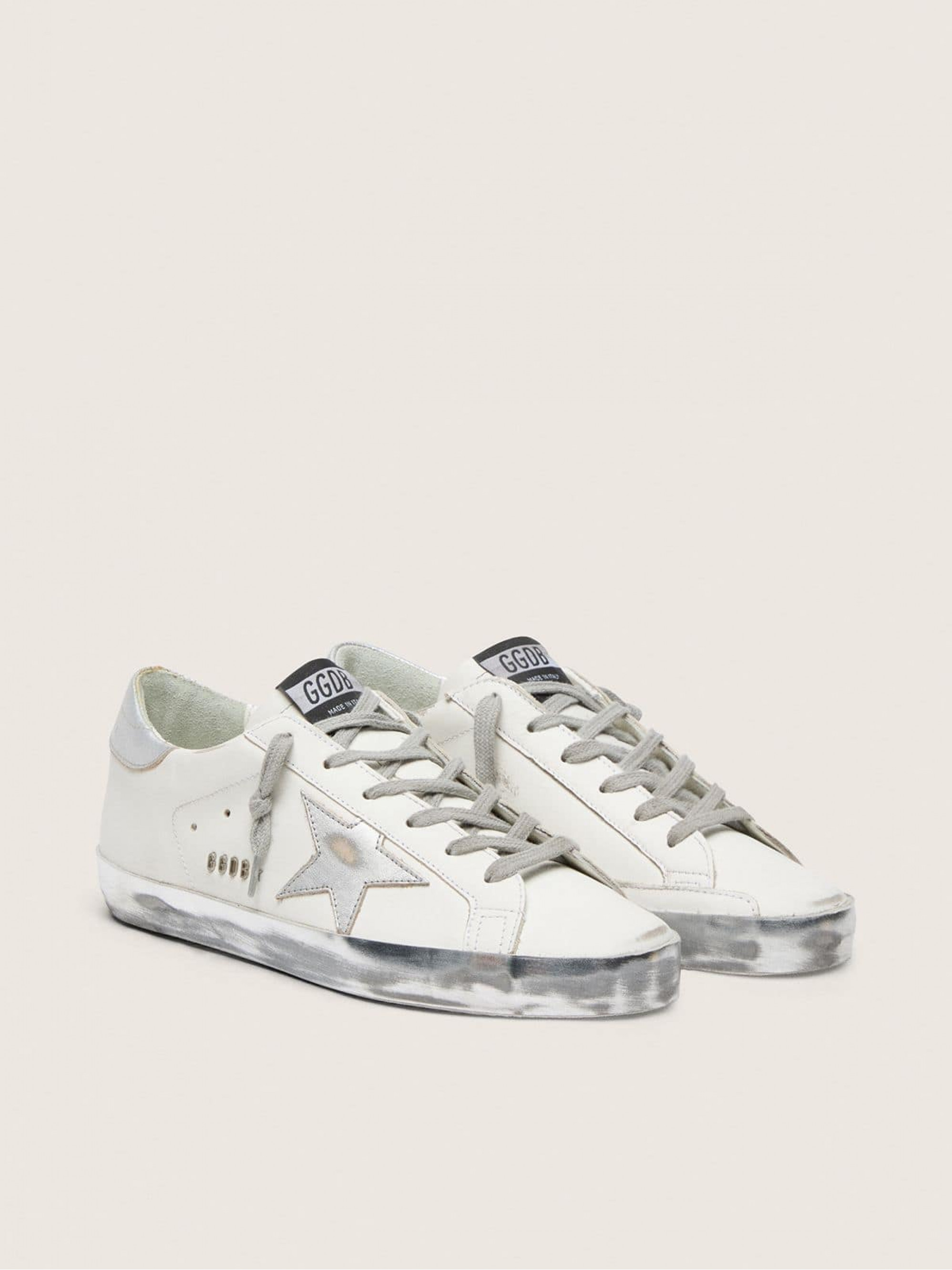 Women's Super-Star with silver sparkle foxing and metal stud lettering