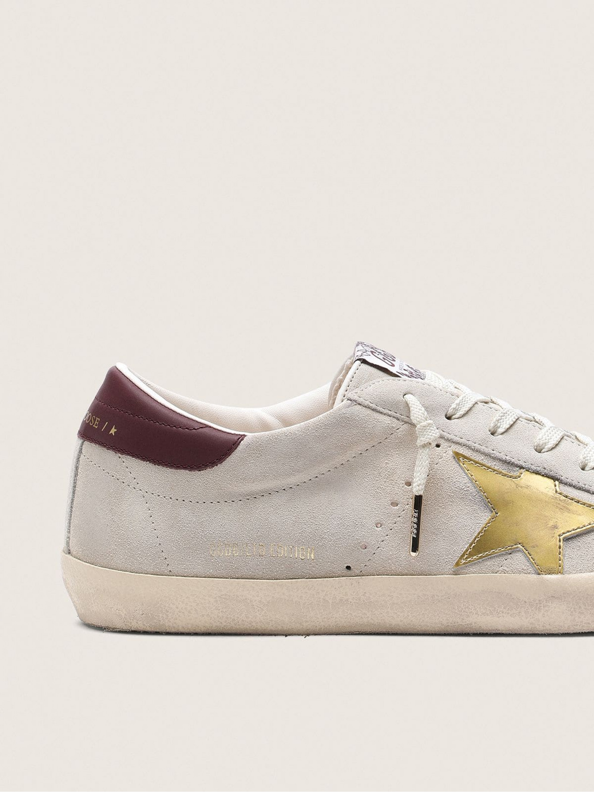 Women's Super-Star CNY in ivory suede with metallic leather star and leather heel tab